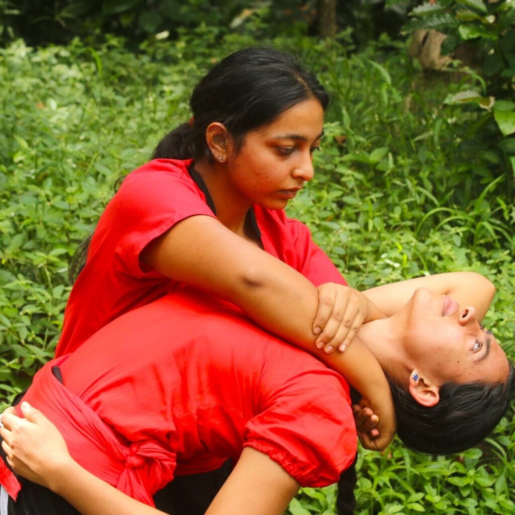 Devika Devarajan performing a traditional technique in Kalari Training.
